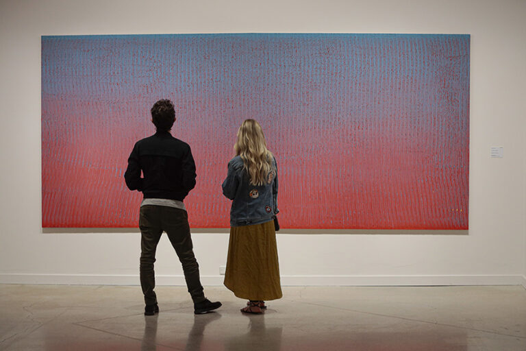 Visitors in the Loriel Beltrán: Constructed Color exhibition